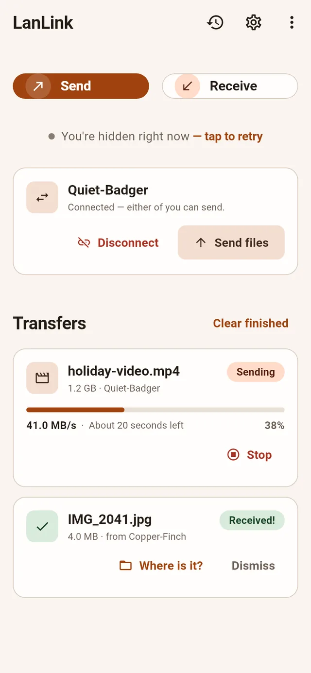 Home screen with a transfer in flight — Send and Receive, live progress at 41 MB/s